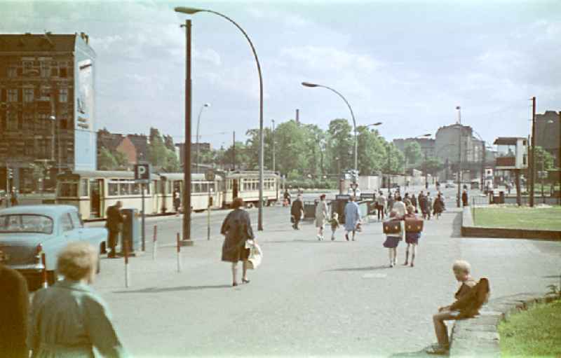 Tram train of the series on Moellendorffstrasse - Frankfurter Allee in the Lichtenberg district of East Berlin in the territory of the former GDR, German Democratic Republic. At the crossing there is a high cabin for traffic monitoring