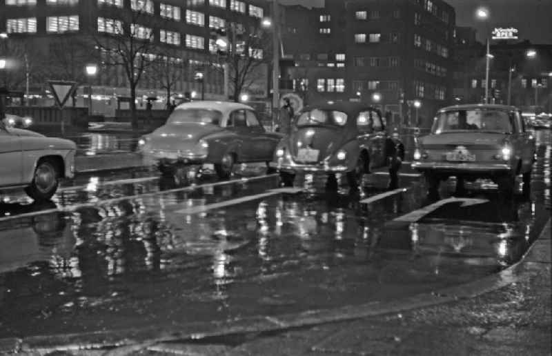 Car - motor vehicle in road traffic of the types Wartburg, Volkswagen VW Beetle and Moskvitch and at the intersection of Friedrichstrasse and Unter den Linden in the Mitte district of Berlin East Berlin in the area of the former GDR, German Democratic Republic