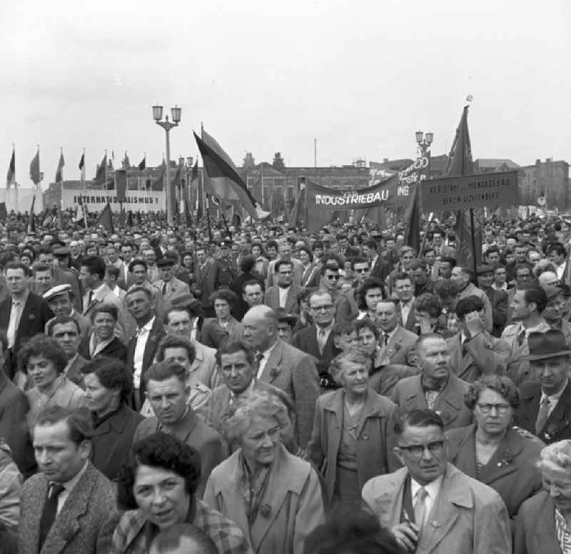 Participants der Demonstrationen zum 1.Mai on the streets of the city center on place Schlossplatz - Marx-Engels-Platz - Lustgarten in the district Mitte in Berlin Eastberlin on the territory of the former GDR, German Democratic Republic