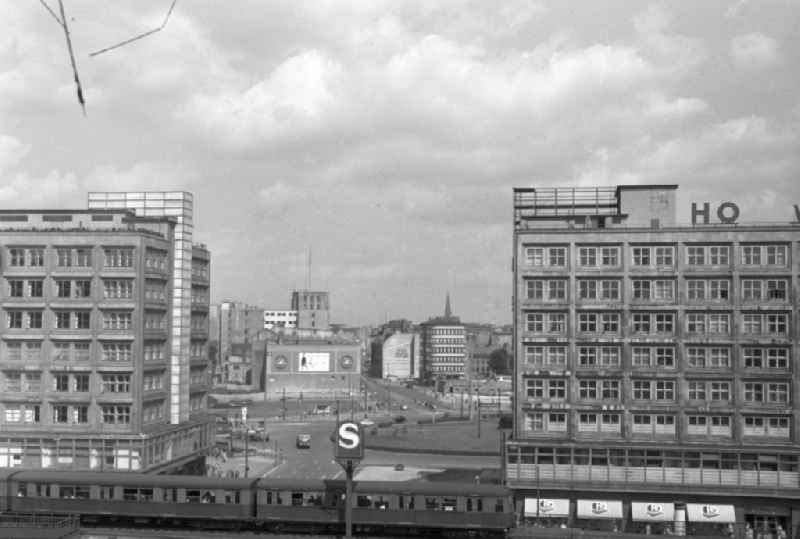 Road traffic and road conditions at the Alexanderhaus and the Berolinahaus in the area of the Alexanderplatz S-Bahn station in the Mitte district of Berlin East Berlin in the area of the former GDR, German Democratic Republic