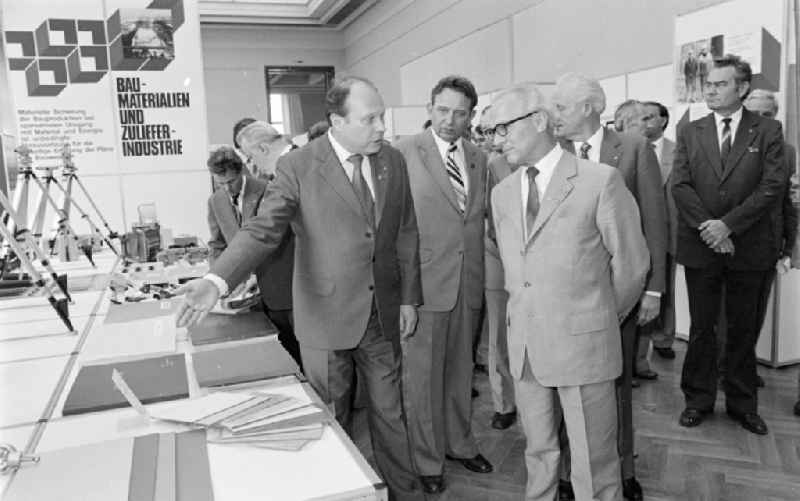 Members of the party and state leadership with the SED General Secretary Erich Honecker and Guenther Mittag as visitors at the exhibition '7th Building Conference' in the Mitte district of East Berlin in the area of the former GDR, German Democratic Republic