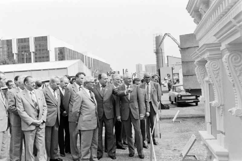 Members of the party and state leadership with the SED General Secretary Erich Honecker and Guenther Mittag as visitors at the exhibition '7th Building Conference' in the Mitte district of East Berlin in the area of the former GDR, German Democratic Republic