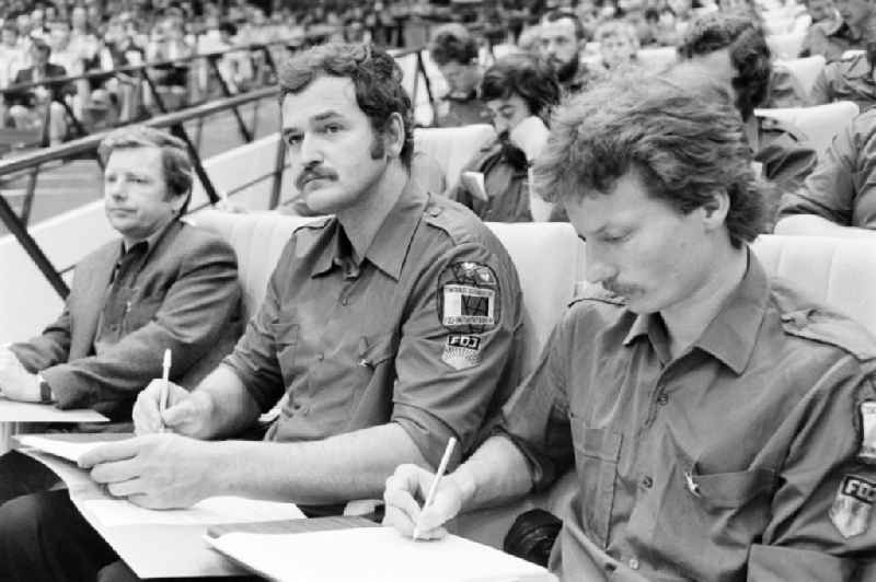 Delegates during the meeting in the 'Great Hall of the Palace of the Republic' on the occasion of the '7th Building Conference' in the Mitte district of East Berlin in the territory of the former GDR, German Democratic Republic