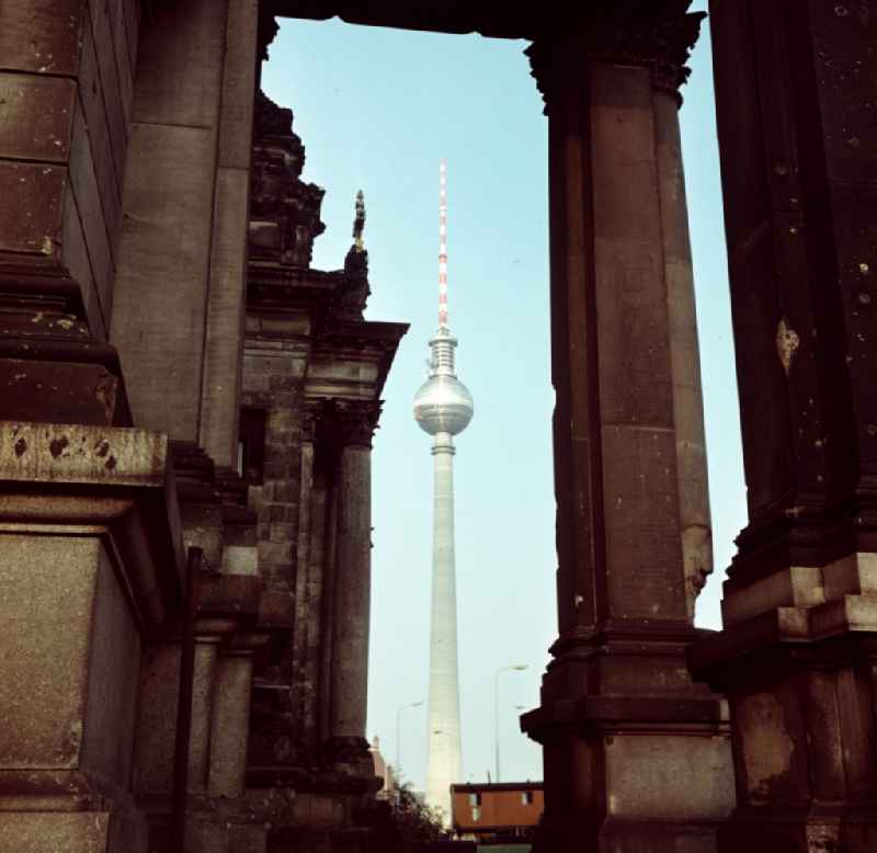 Cathedral - facade and roof of the sacred building 'Berlin Cathedral' with the television tower in the background on the street Am Lustgarten in the Mitte district of Berlin East Berlin on the territory of the former GDR, German Democratic Republic