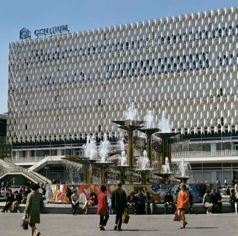 Popular water feature - fountain 'Fountain of Friendship of Peoples' on Alexanderplatz in front of the Centrum department store in the Mitte district of Berlin East Berlin on the territory of the former GDR, German Democratic Republic