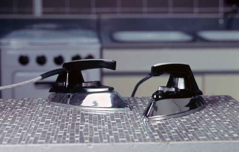 Household appliance iron 'Electric BR27' of the manufacturer 'AKA' in a kitchen household in Berlin East Berlin in the territory of the former GDR, German Democratic Republic