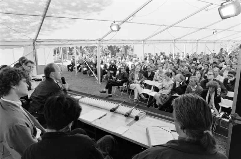 Art Academy Berlin-Weissensee East Berlin on the territory of the former GDR, German Democratic Republic. Participants sit in the tent during the architect's colloquium