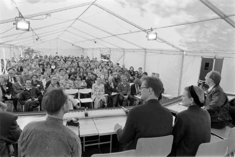 Art Academy Berlin-Weissensee East Berlin on the territory of the former GDR, German Democratic Republic. Participants sit in the tent during the architect's colloquium