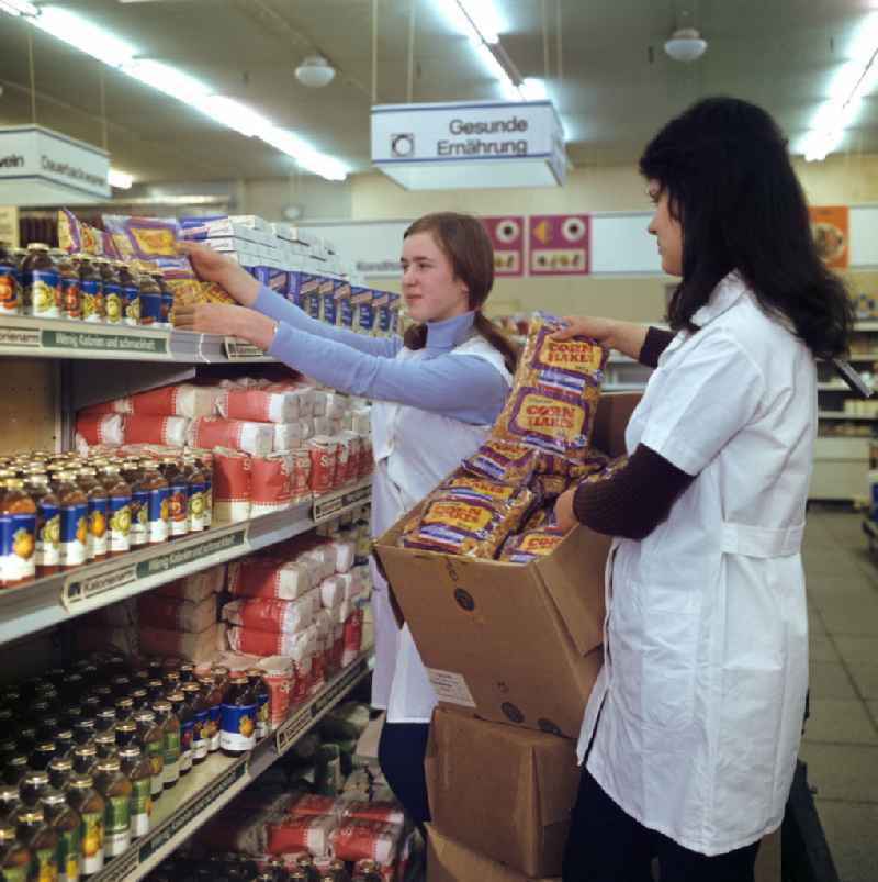 Mall shopping center with shelves filled with healthy food on street Spandauer Strasse in Berlin Eastberlin on the territory of the former GDR, German Democratic Republic