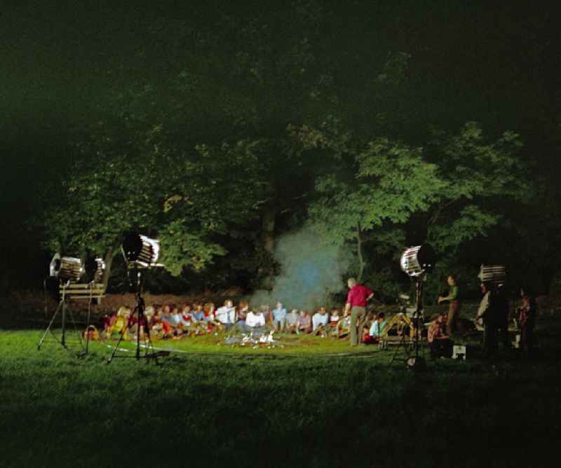 Scene from the film and television production ' Portrait of a Center ' with Sorbian villagers at a nighttime campfire in Crostwitz, Saxony in the area of the former GDR, German Democratic Republic