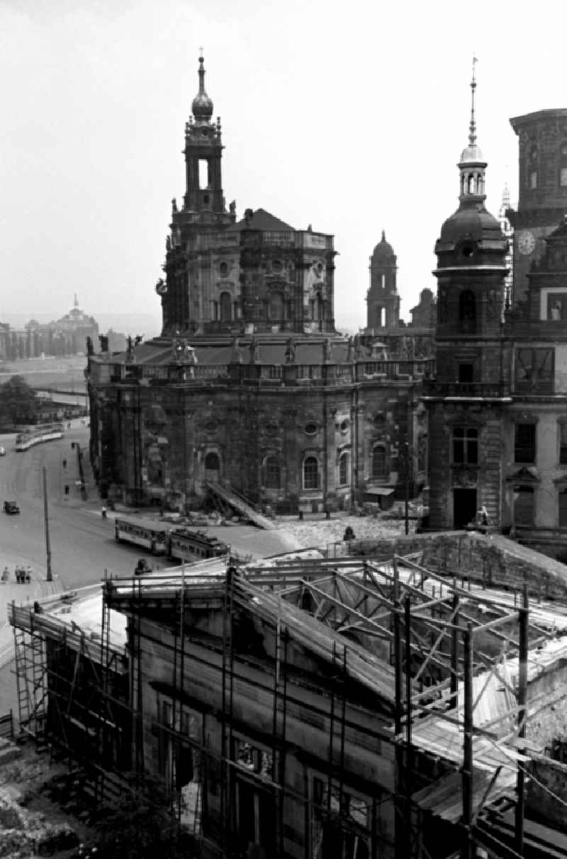 Construction site for the reconstruction of the war-damaged ruins of the Dresden Zwinger on Theaterplatz - Sophienstrasse in the Altstadt district of Dresden in the state of Saxony on the territory of the former GDR, German Democratic Republic