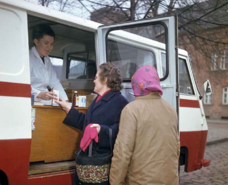 Dispensing and ordering medication at a mobile pharmacy, photographed in the 196