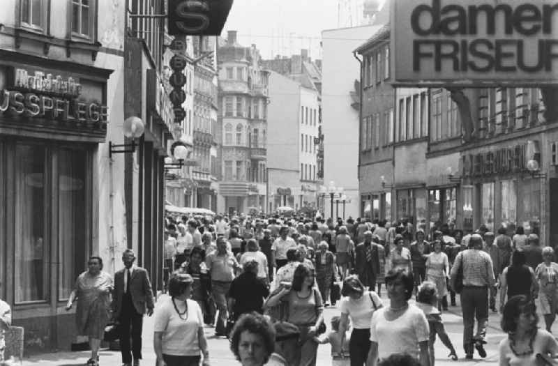 Tourist attraction, strolling and shopping street Klement-Gottwald-Strasse (today Leipziger Strasse) in Halle (Saale), Saxony-Anhalt in the territory of the former GDR, German Democratic Republic