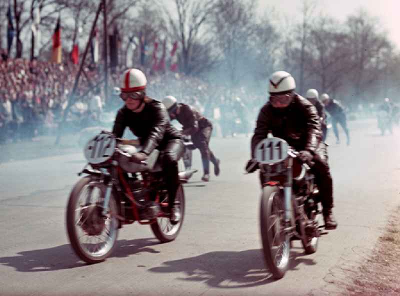 The starting numbers 111 and 112 on the race track at the motorcycle race on the Sachsenring in Hohenstein-Ernstthal, Saxony in the territory of the former GDR, German Democratic Republic