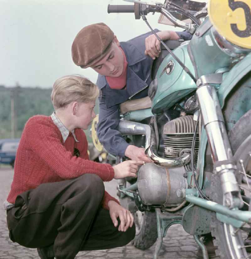 Checking a participating MZ motorcycle before the race at the Sachsenring in Hohenstein-Ernstthal, Saxony in the territory of the former GDR, German Democratic Republic