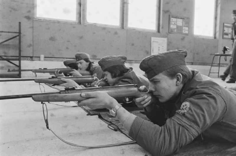 Practical training with a pre-military character in preparation for military service in der Uniform der GST Gesellschaft fuer Sport und Technik in Hoppegarten, Brandenburg on the territory of the former GDR, German Democratic Republic