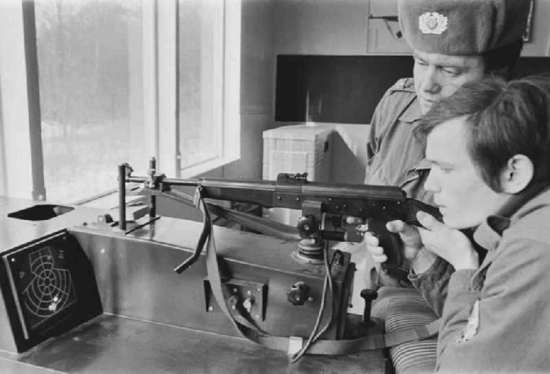 Practical training with a pre-military character in preparation for military service in der Uniform der GST Gesellschaft fuer Sport und Technik in Hoppegarten, Brandenburg on the territory of the former GDR, German Democratic Republic