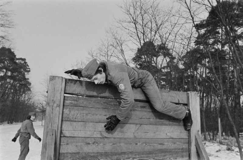 Practical training with a pre-military character in preparation for military service in der Uniform der GST Gesellschaft fuer Sport und Technik in Hoppegarten, Brandenburg on the territory of the former GDR, German Democratic Republic