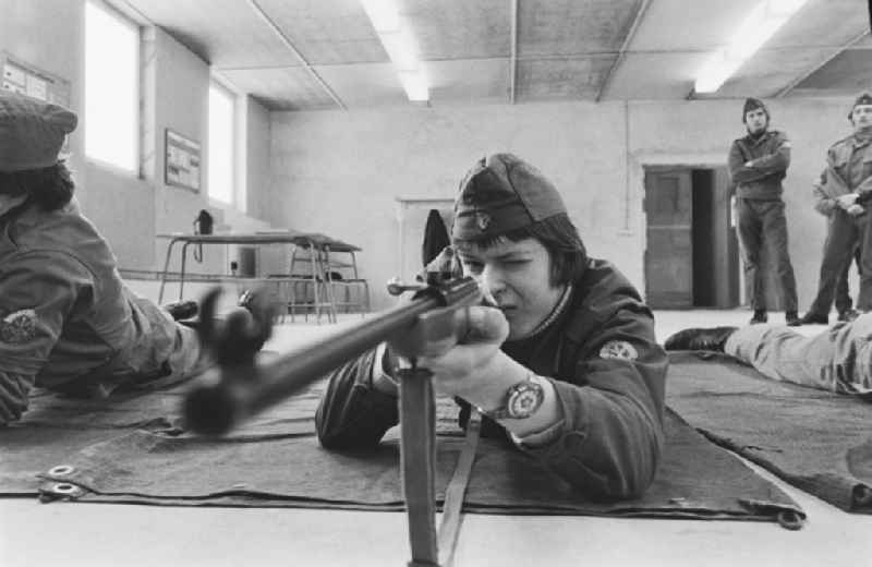 Practical training with a pre-military character in preparation for military service in der Uniform der GST Gesellschaft fuer Sport und Technik in Hoppegarten, Brandenburg on the territory of the former GDR, German Democratic Republic