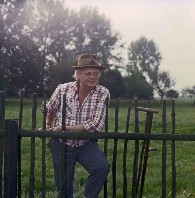 The Sorbian children's book author Jan Worner as a scene from the film and television production 'Portrait of a Center' on the main street in Horka, Saxony in the territory of the former GDR, German Democratic Republic