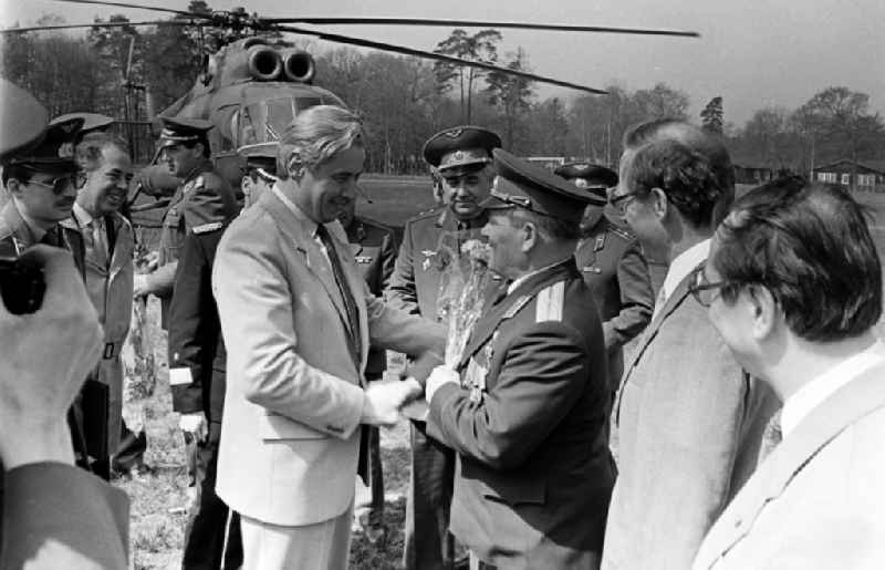 Colonel Mikhail Petrovich Dewjatajew with members of the LSK air force stationed on the island - air defense and the People's Navy and officers of the GSSD 'Group of Soviet Forces in Germany' at the grove of honor of the NVA - office in Karlshagen in the state of Mecklenburg-Western Pomerania on the territory of the former GDR, German Democratic Republic