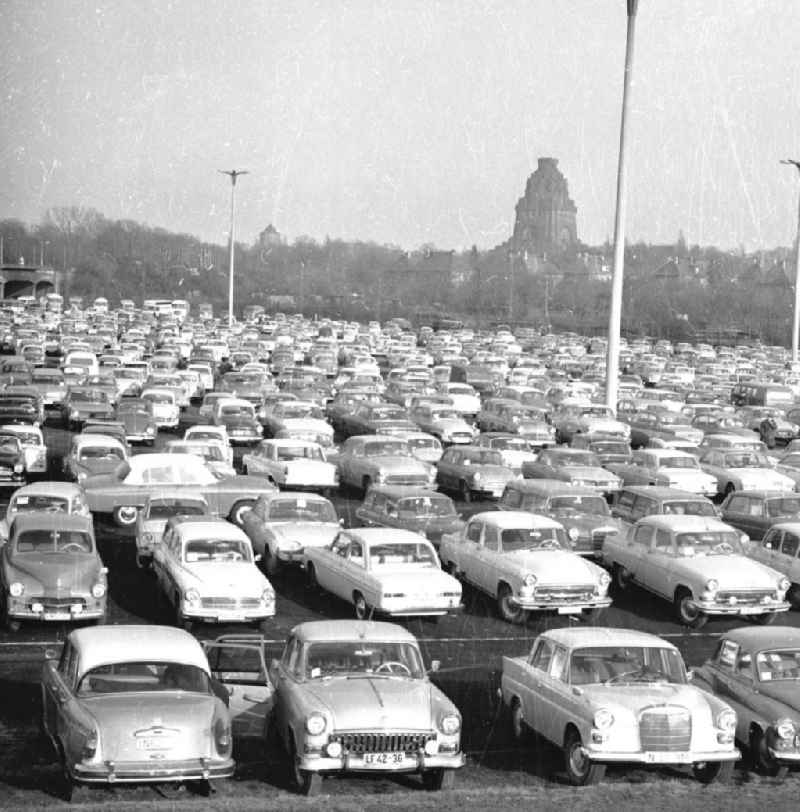 Cars parked in a parking lot during the spring fair in Leipzig, Saxony in the territory of the former GDR, German Democratic Republic