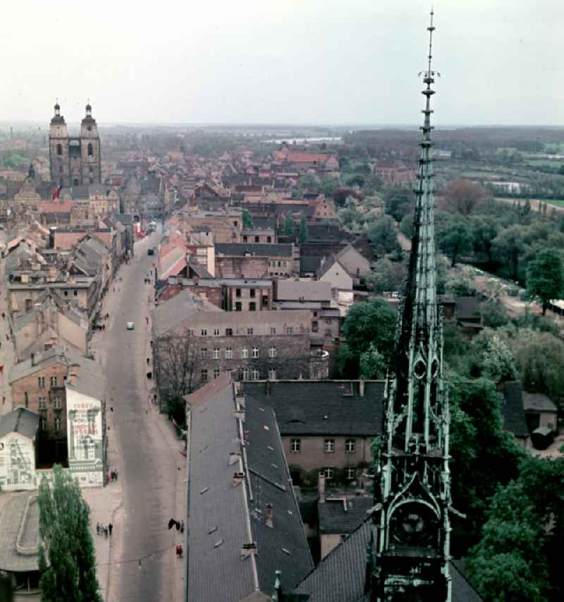 Traffic situation in the street area on place Schlossplatz in Lutherstadt Wittenberg, Saxony-Anhalt on the territory of the former GDR, German Democratic Republic