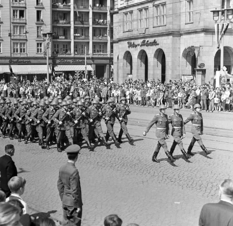 Soldiers of the land forces marching on May 1st demonstration in Magdeburg. May Day is also known as May Day, Labor Day or achievements of the international labor movement