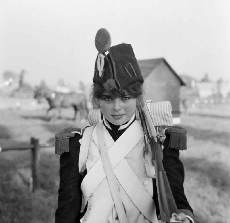 Young woman in historical Prussian uniform at the time of the wars of liberation as a member of the working group 'Wars of Liberation 1813' in Markkleeberg in the state of Saxony on the territory of the former GDR, German Democratic Republic