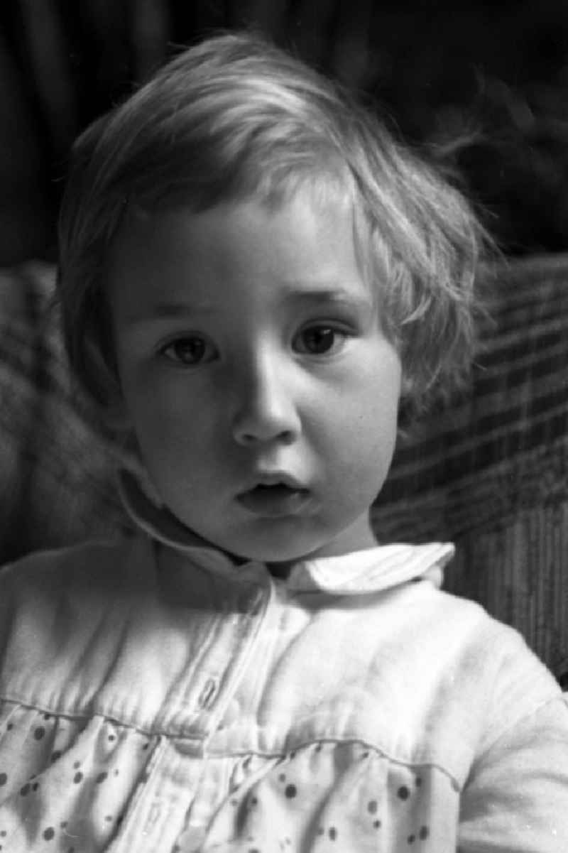 Child in the portrait in Merseburg in the federal state Saxony-Anhalt in the area of the former GDR, German democratic republic