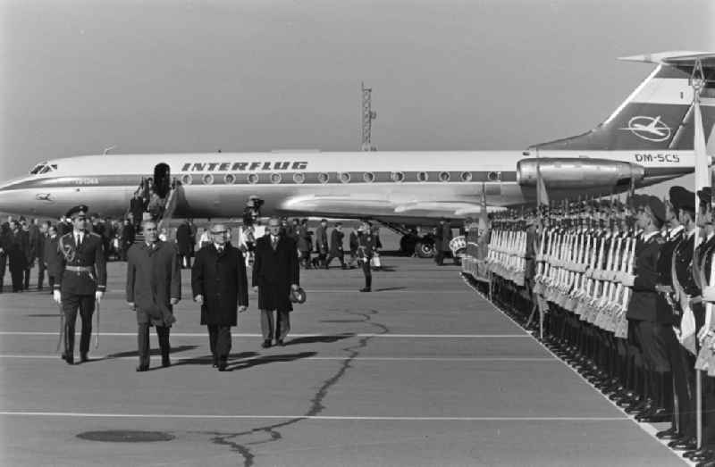 State ceremony and reception of Erich Honecker and the government delegation of the GDR with a military honor guard in front of the landed INTERFLUG special aircraft TU 134 A with the registration DM-SCS at the airport in Moskva - Moscow in Russia - formerly the Soviet Union