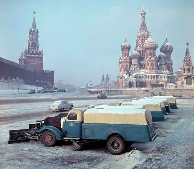 Red Square in winter with snow clearing vehicles and St. Basil's Cathedral in Moskva - Moscow in Russia