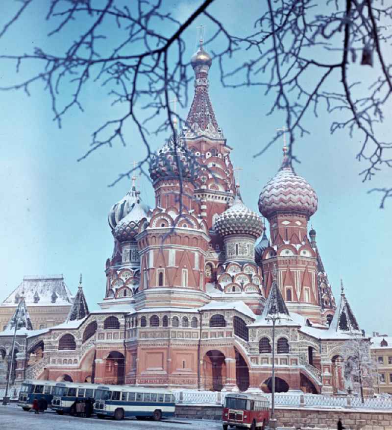 Red Square in winter with buses in front of St. Basil's Cathedral in Moskva - Moscow in Russia