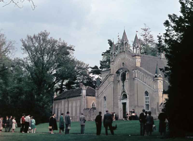 Visitors in front of the Gothic House in Woerlitz Park in Oranienbaum-Woerlitz, Saxony-Anhalt in the territory of the former GDR, German Democratic Republic