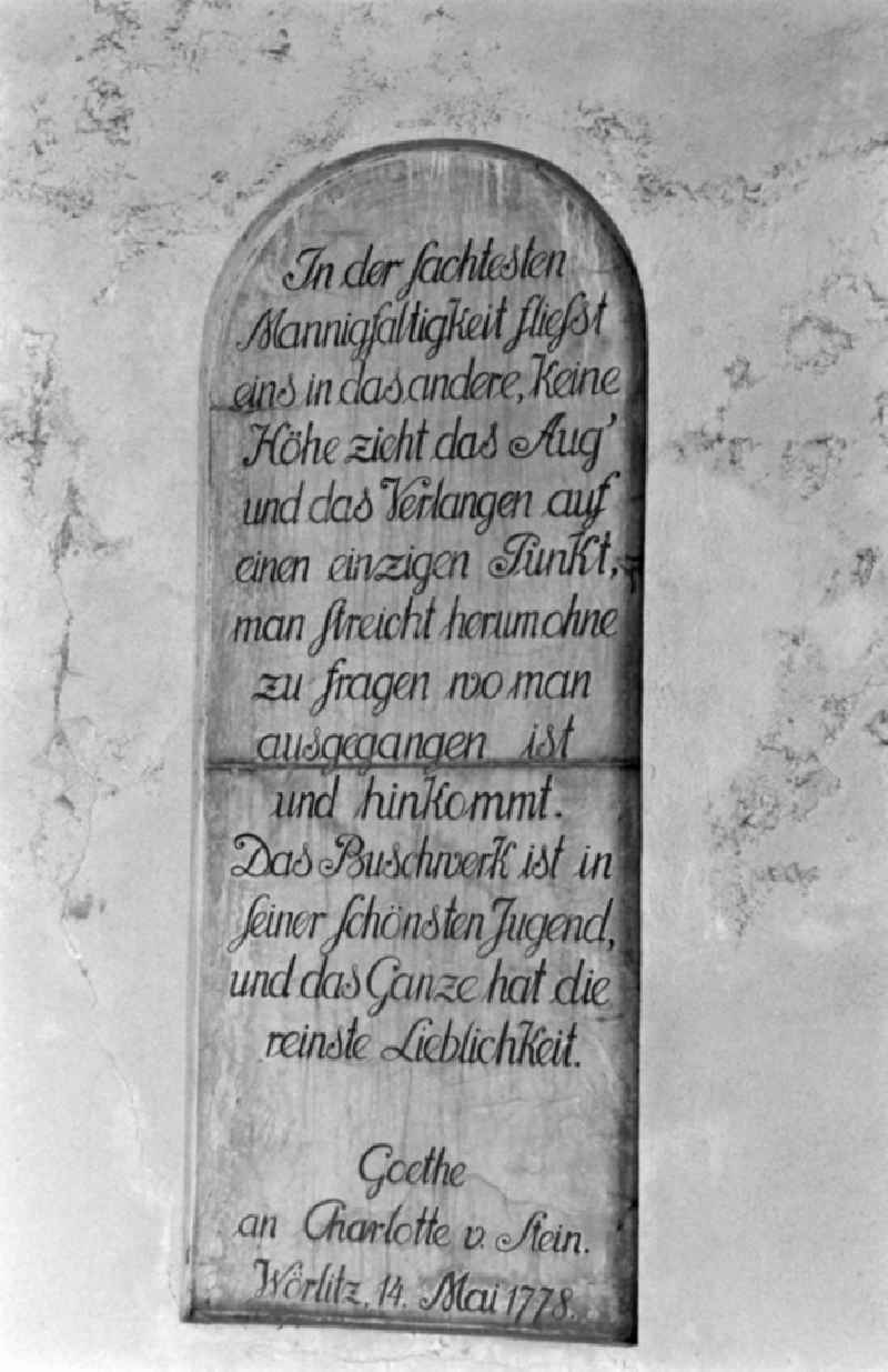 Wall decoration at the Nymphaeum with a plaque showing a quote from a letter from Goethe to Charlotte von Stein in Woerlitzer Park in Oranienbaum-Woerlitz, Saxony-Anhalt in the territory of the former GDR, German Democratic Republic