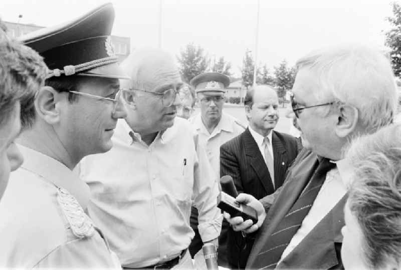 Wolfgang Herger, head of the security affairs department at the Central Committee of the SED at a meeting in the NVA National People's Army office on the occasion of a troop visit by American army personnel and military observers in the radio relay regiment-2 'Konrad Wolf' (RiFuR-2) in Oranienburg, Brandenburg in the territory of the former GDR, German Democratic Republic