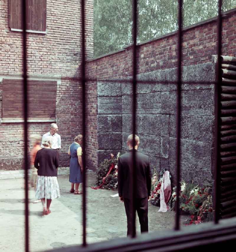 Facades of the remaining buildings of the concentration camp visitors and tourists warn against forgetting in Oswiecim - Auschwitz in Poland