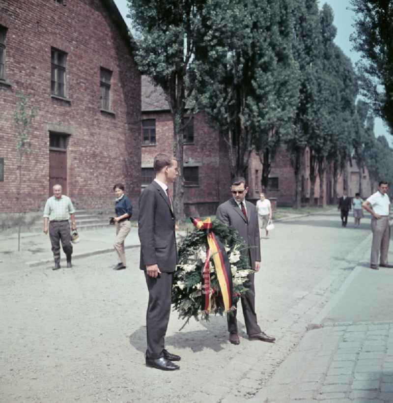 Facades of the remaining buildings of the concentration camp visitors and tourists warn against forgetting in Oswiecim - Auschwitz in Poland