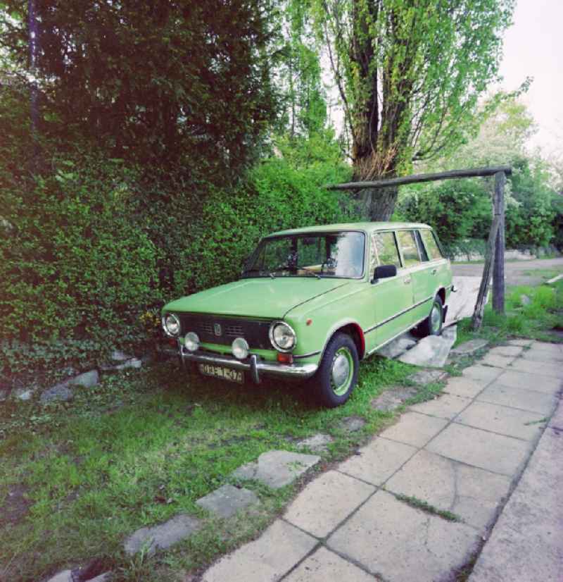 Green Cars - motor vehicles in a parking lot Lada 120