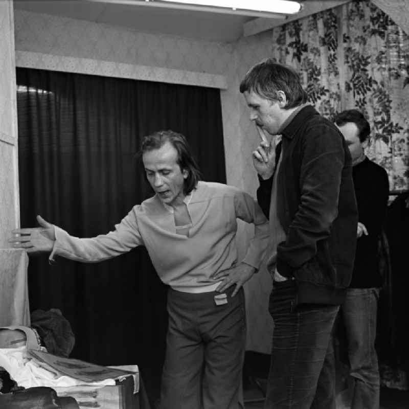 Scene from the film and television production 'Rublak - The Legend of the Surveyed Land' on August-Bebel-Strasse in the Babelsberg district of Potsdam, Brandenburg in the area of the former GDR, German Democratic Republic. The actor Christian Grashof trying on his costume