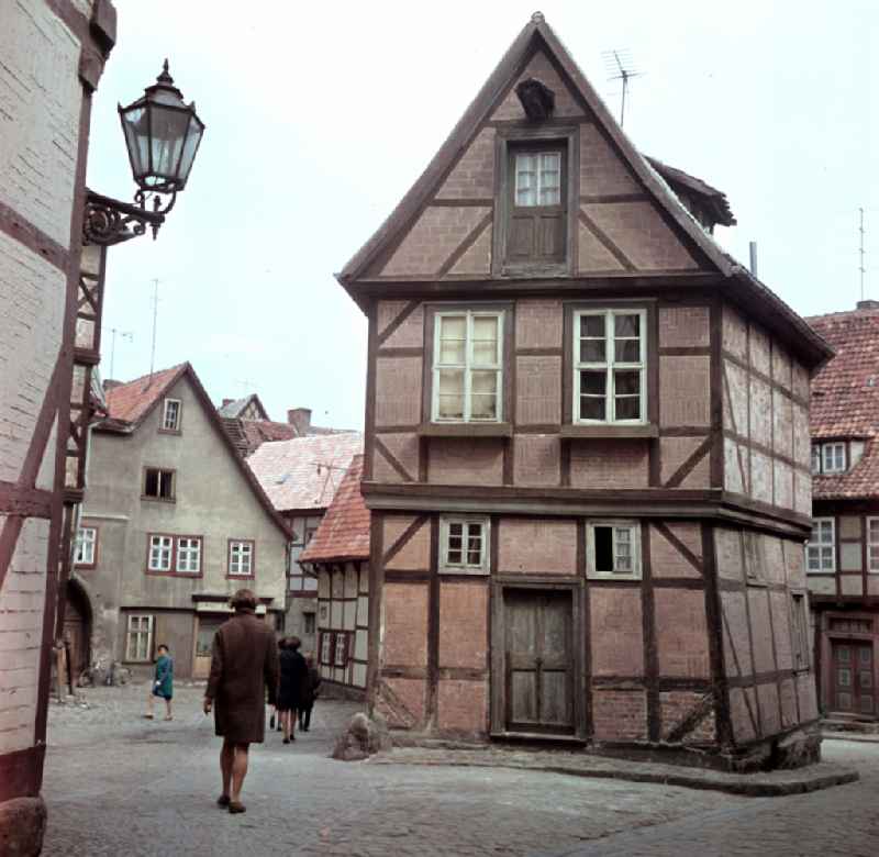 Half-timbered facade and building front south gable in the street Finkenherd in the city center of Quedlinburg, Saxony-Anhalt in the territory of the former GDR, German Democratic Republic