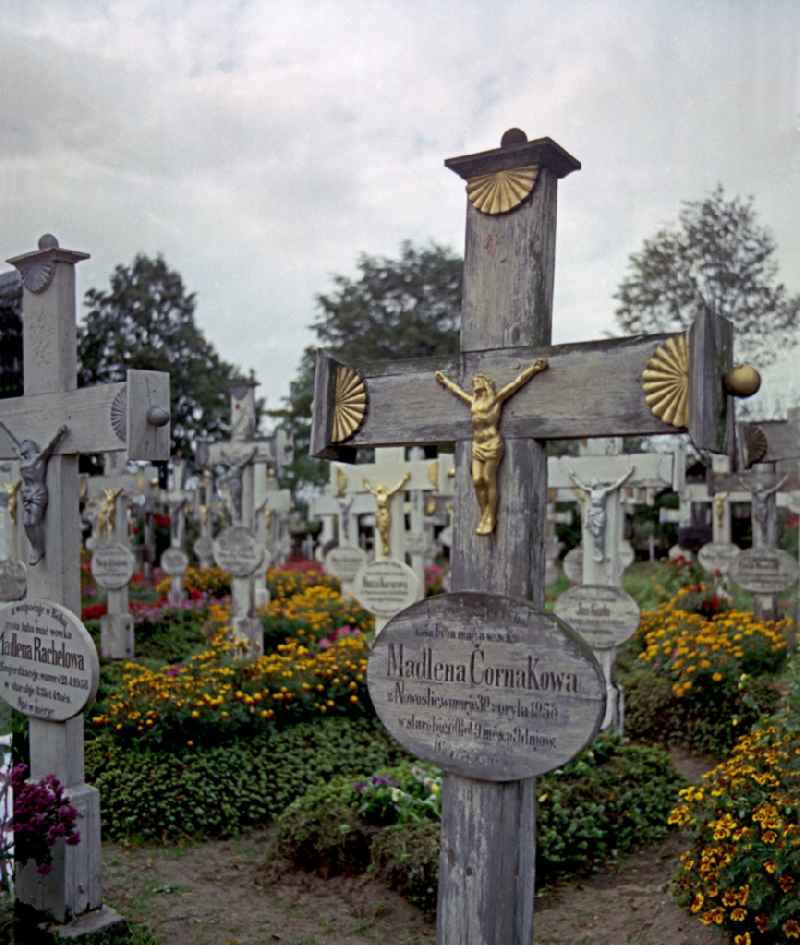 Cultural-historical grave cross and gravestone ensemble in the Sorbian cemetery on the main street in Ralbitz-Rosenthal, Saxony in the territory of the former GDR, German Democratic Republic