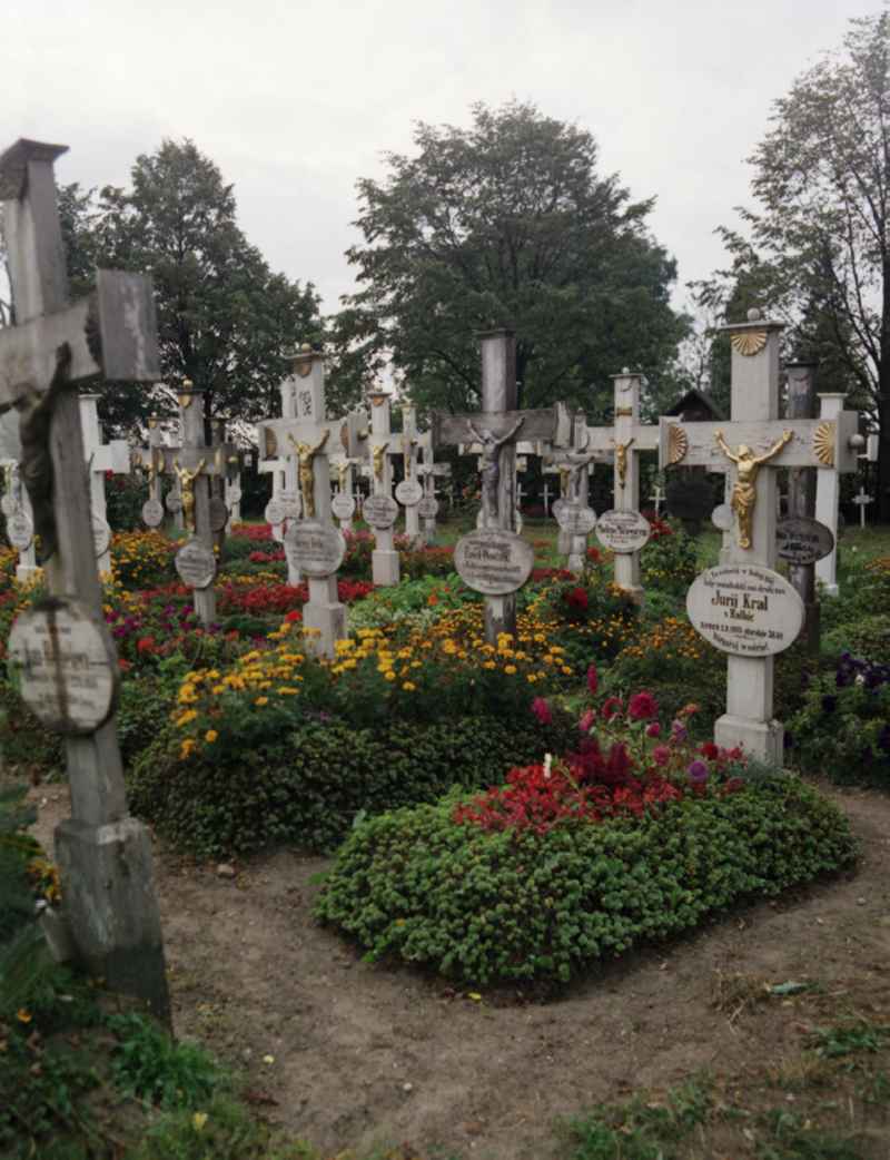 Cultural-historical grave cross and gravestone ensemble in the Sorbian cemetery on the main street in Ralbitz-Rosenthal, Saxony in the territory of the former GDR, German Democratic Republic