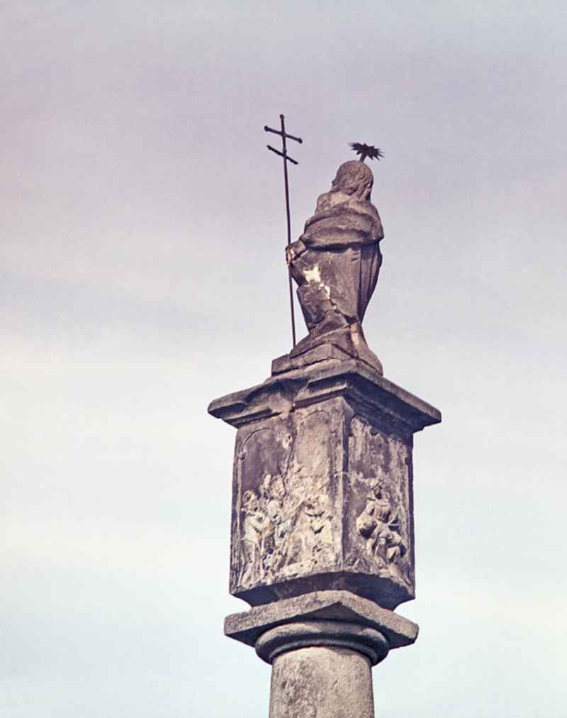 Tourist Attraction and Landmark Statue of a saint at the edge of the field in Raeckelwitz, Saxony on the territory of the former GDR, German Democratic Republic