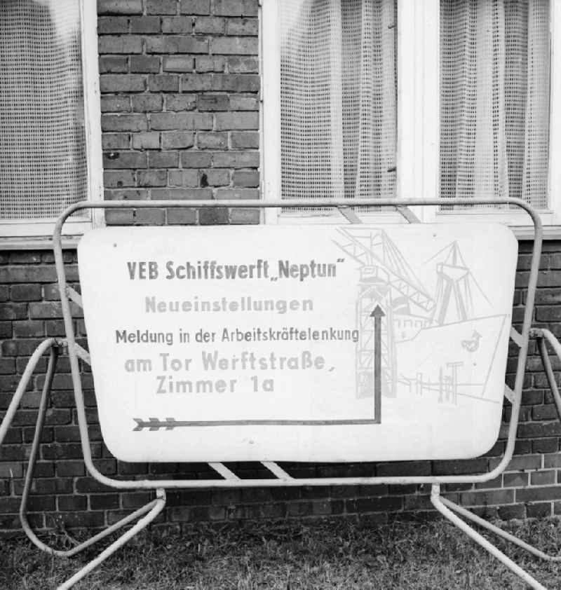 Sign of the dockyard VEB Neptune above the way in the personnel office / manpower steering system in Rostock in the federal state Mecklenburg-West Pomerania in the area of the former GDR, German democratic republic