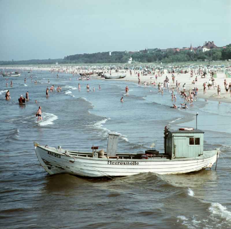 Sandy beach of the Baltic Sea with bathers and holidaymakers on street Duenenstrasse in Seebad Ahlbeck, Mecklenburg-Western Pomerania on the territory of the former GDR, German Democratic Republic