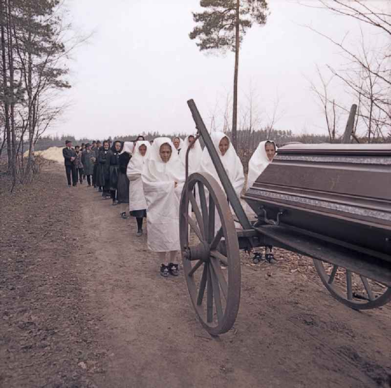 Scene from the film 'Rublak - The Legend of the Surveyed Land' Funeral ceremony with Sorbian mourning costumes on the village street in Sprey, Saxony in the area of the former GDR, German Democratic Republic