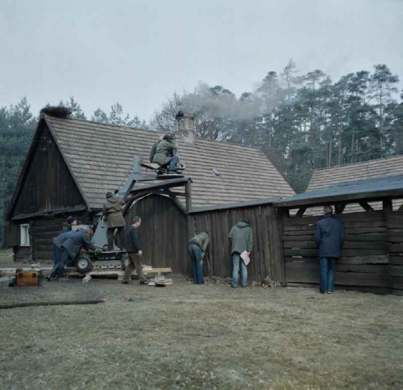 Scene from the film and television production 'The Legend of the Surveyed Land' in Weisskeissel, Saxony in the area of the former GDR, German Democratic Republic. A camera on a crane in front of the gates of a farm and homestead