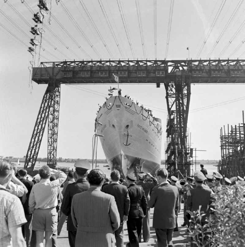 Launch of 'MS Fritz Heckert' (a cruise ship operated by VEB Deutsche Seereederei Rostock) from the shipbuilding dock on the shipyard site of VEB Mathias-Thesen-Werft in Wismar, Mecklenburg-Western Pomerania in the area of the former GDR, German Democratic Republic