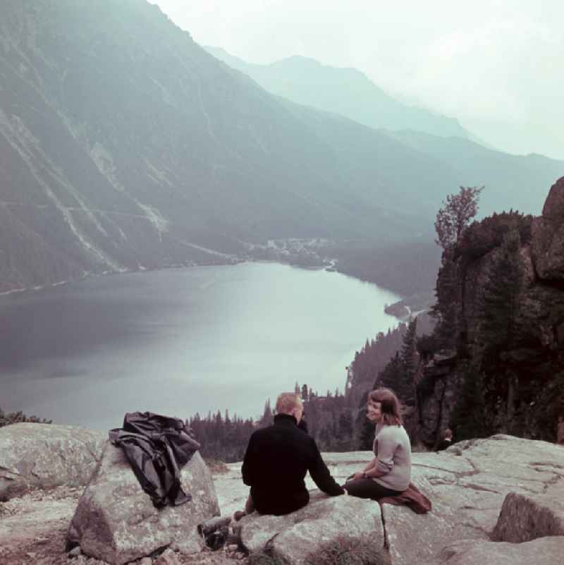 Resting while hiking in the High Tatras at the mountain lake Morskie Oko 'Sea Eye' in Zakopane in Poland